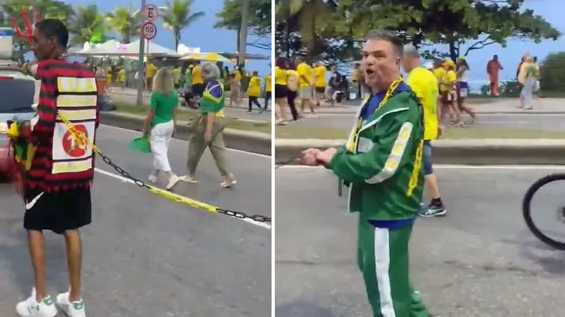 Imagem de protesto político com uso de correntes em pessoa negra no Rio de Janeiro.